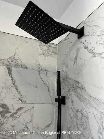 a close view of a bathtub in a bathroom