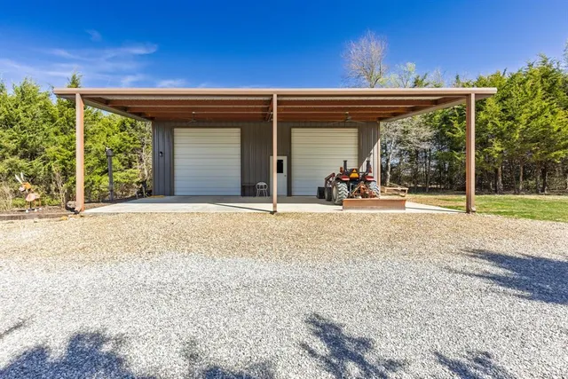 a view of a house with outdoor space and porch