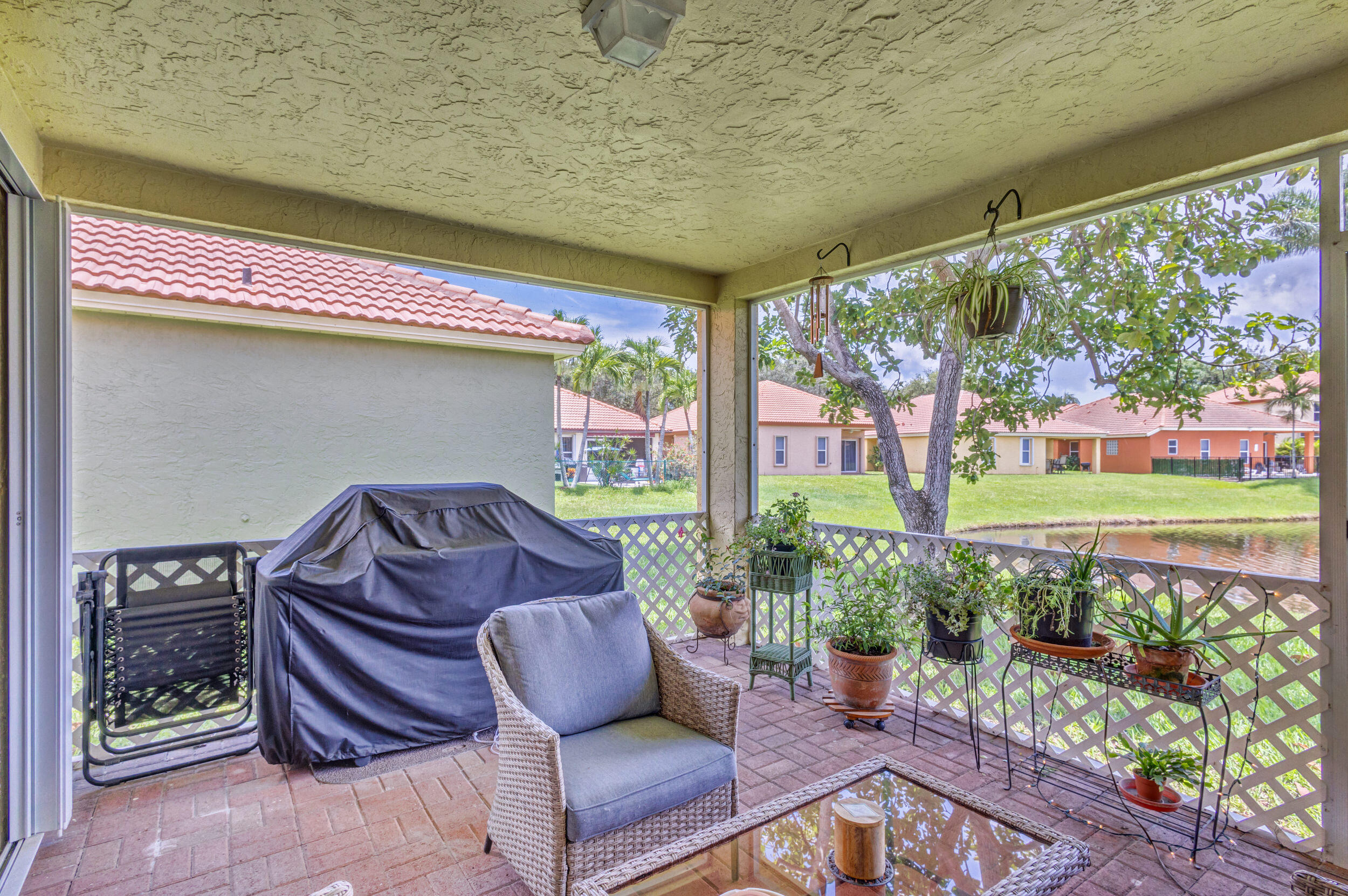 5015 Elpine Way Riviera Beach, FL 33418 - Photo 42 of 65 Screened Patio