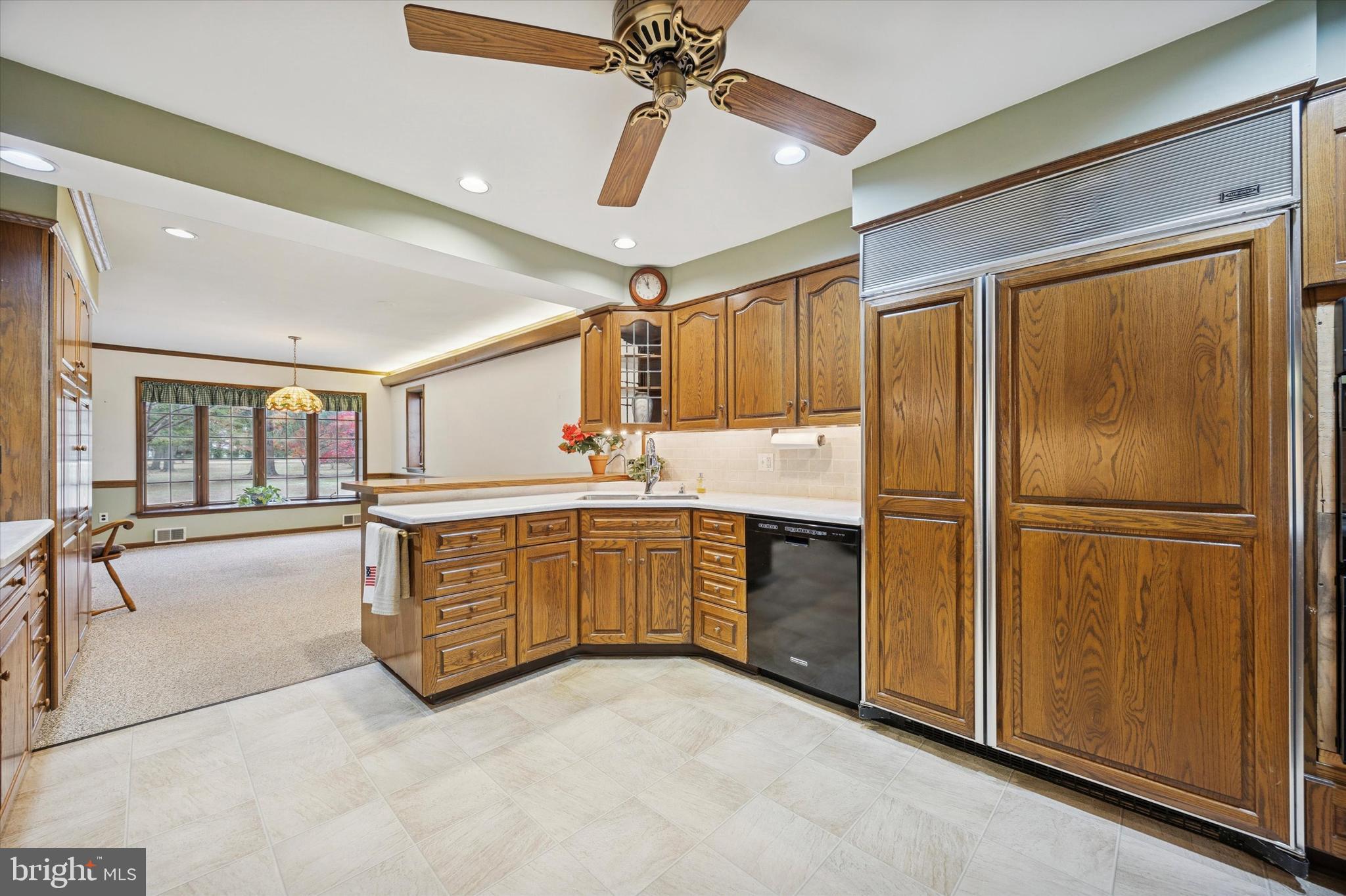 1162 Limekiln Pike Ambler, PA 19002 - Photo 15 of 56 a kitchen with sink cabinets and refrigerator