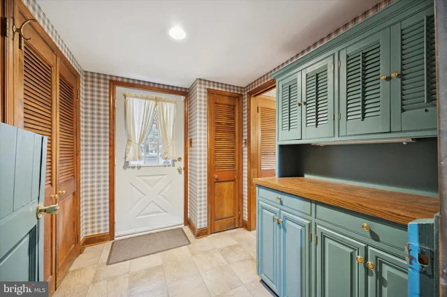 a room with furniture and window