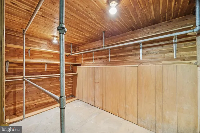 a bathroom with a sink a mirror and a bathtub
