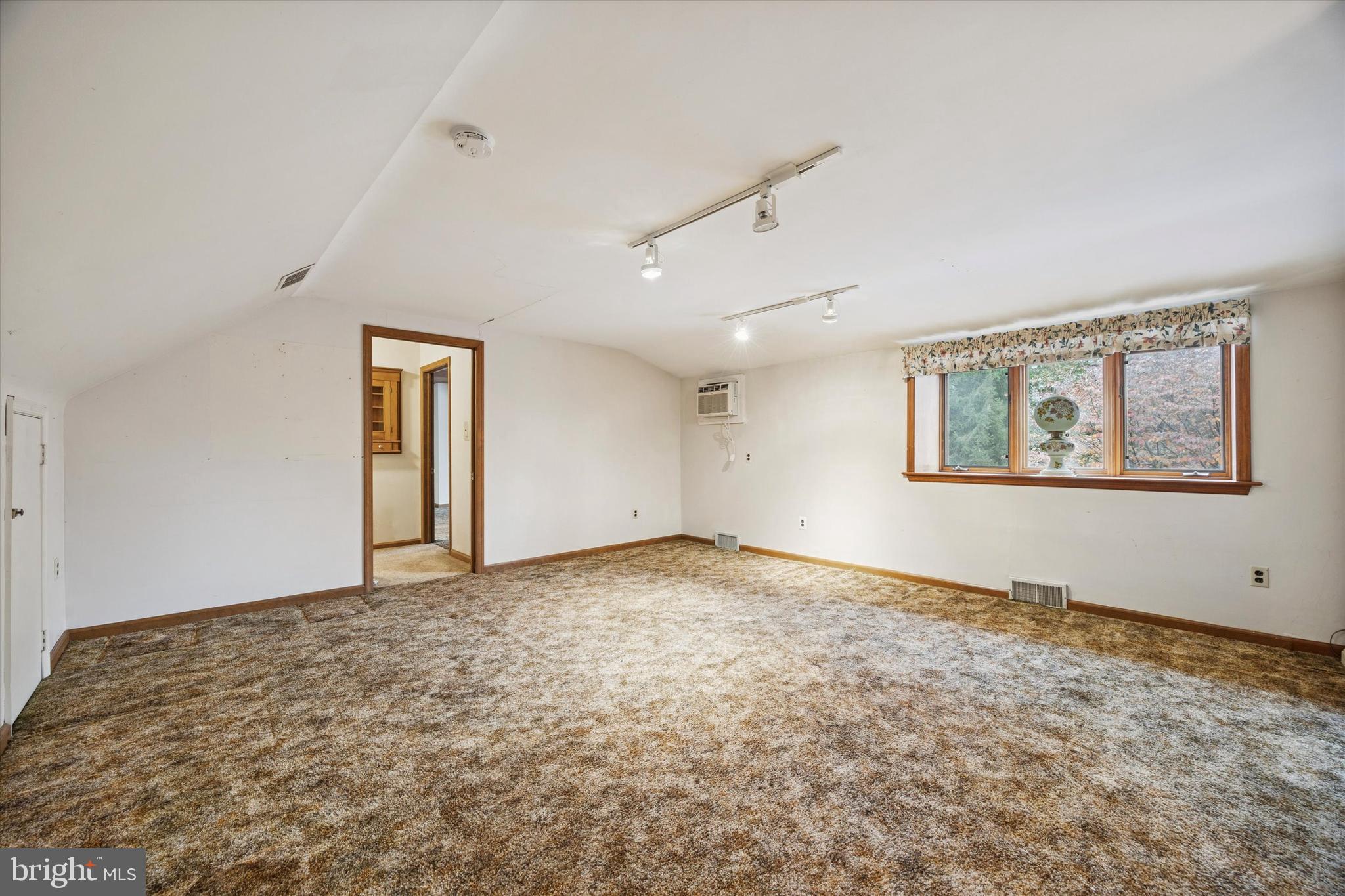 1162 Limekiln Pike Ambler, PA 19002 - Photo 35 of 56 a view of an empty room with a window