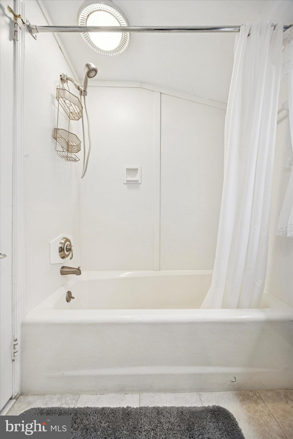 1162 Limekiln Pike Ambler, PA 19002 - Photo 42 of 56 a bathroom with a shower and a bath tub