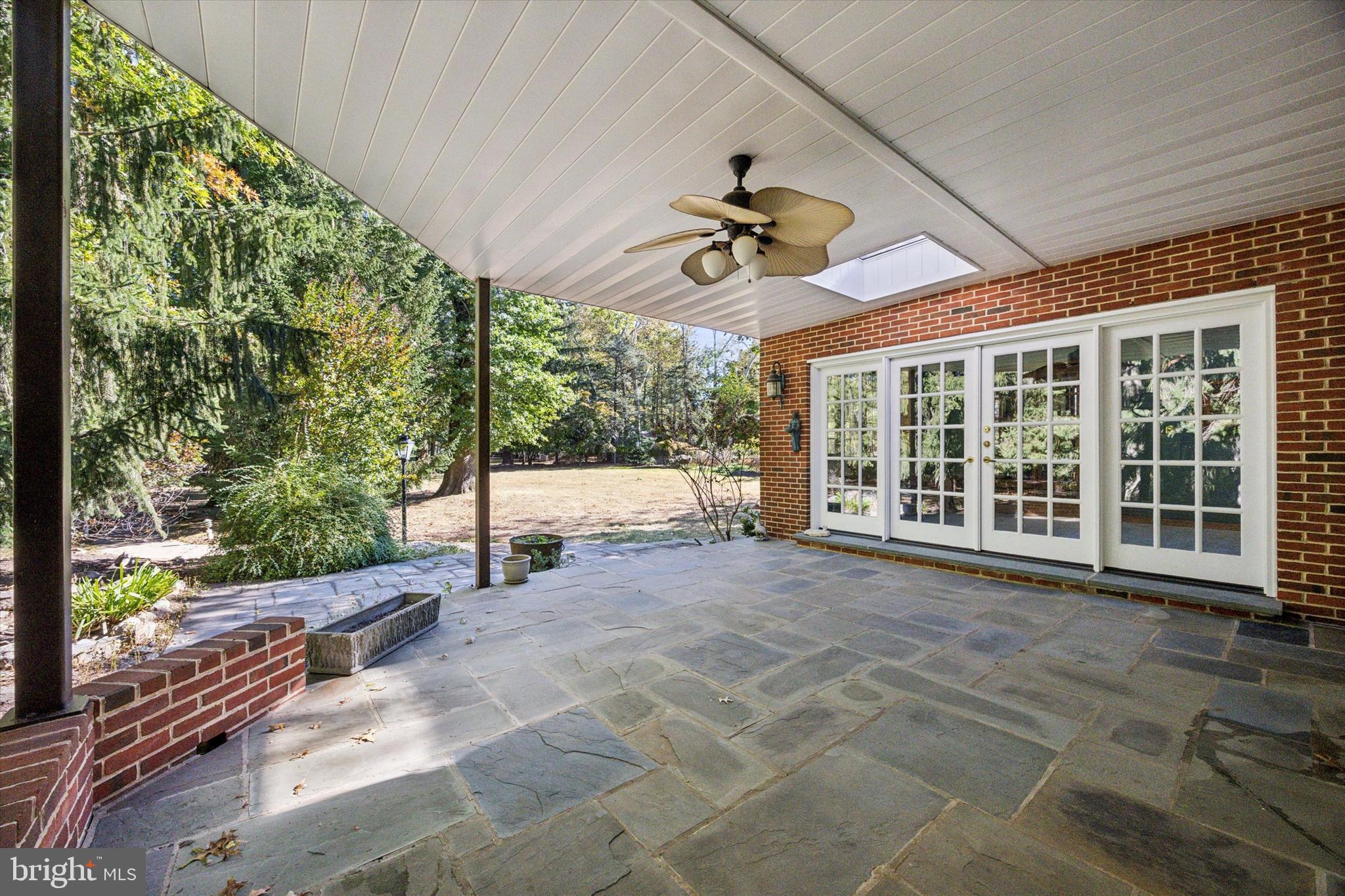 1162 Limekiln Pike Ambler, PA 19002 - Photo 45 of 56 a view of a porch with furniture and a yard
