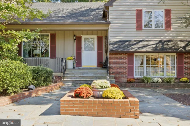 a view of porch with a chairs and table in a patio