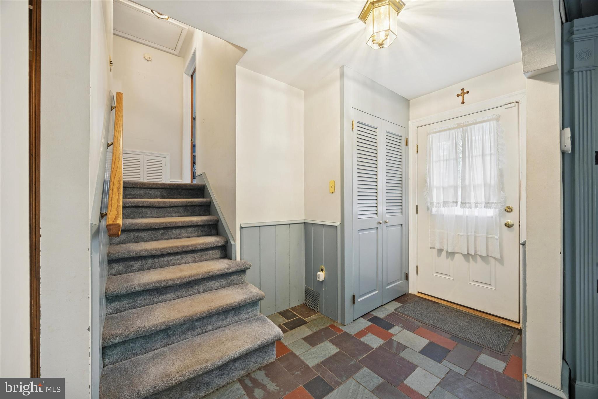 1162 Limekiln Pike Ambler, PA 19002 - Photo 8 of 56 a view of a hallway with wooden floor and staircase
