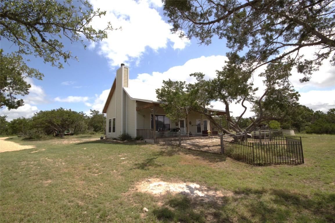 51 Dead End Rd Mountain Junction, TX 76849 - Photo 12 of 32 a backyard of a house with lots of green space