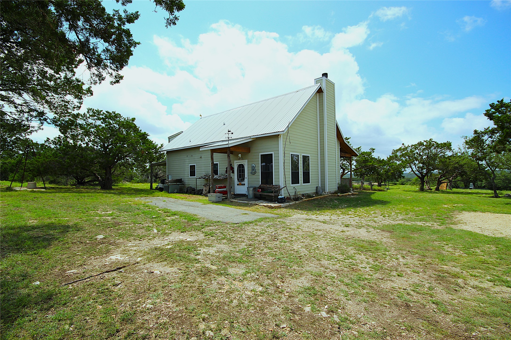 51 Dead End Rd Mountain Junction, TX 76849 - Photo 24 of 32 a front view of house with yard and green space