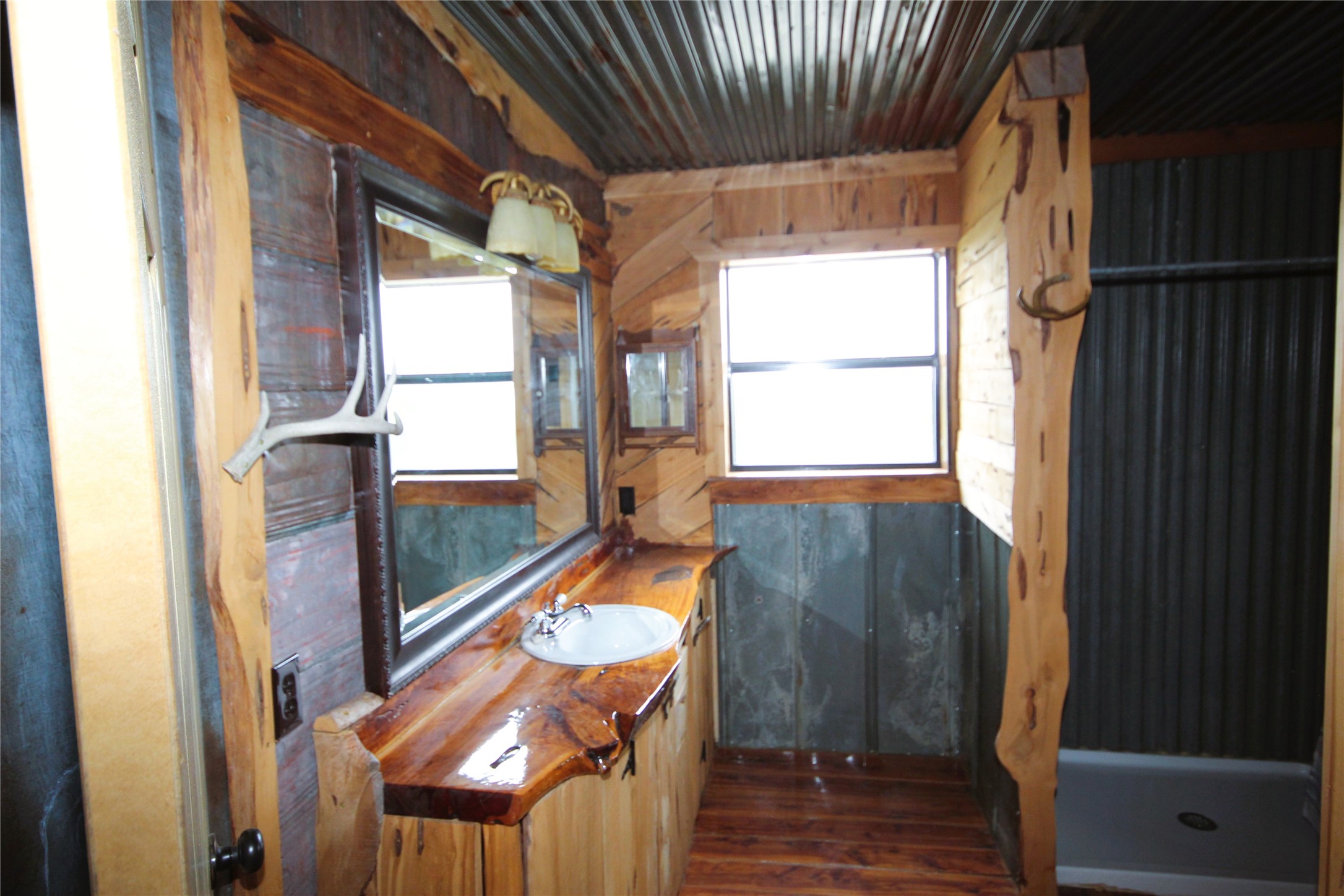 51 Dead End Rd Mountain Junction, TX 76849 - Photo 4 of 32 a view of a porch with wooden floor and furniture