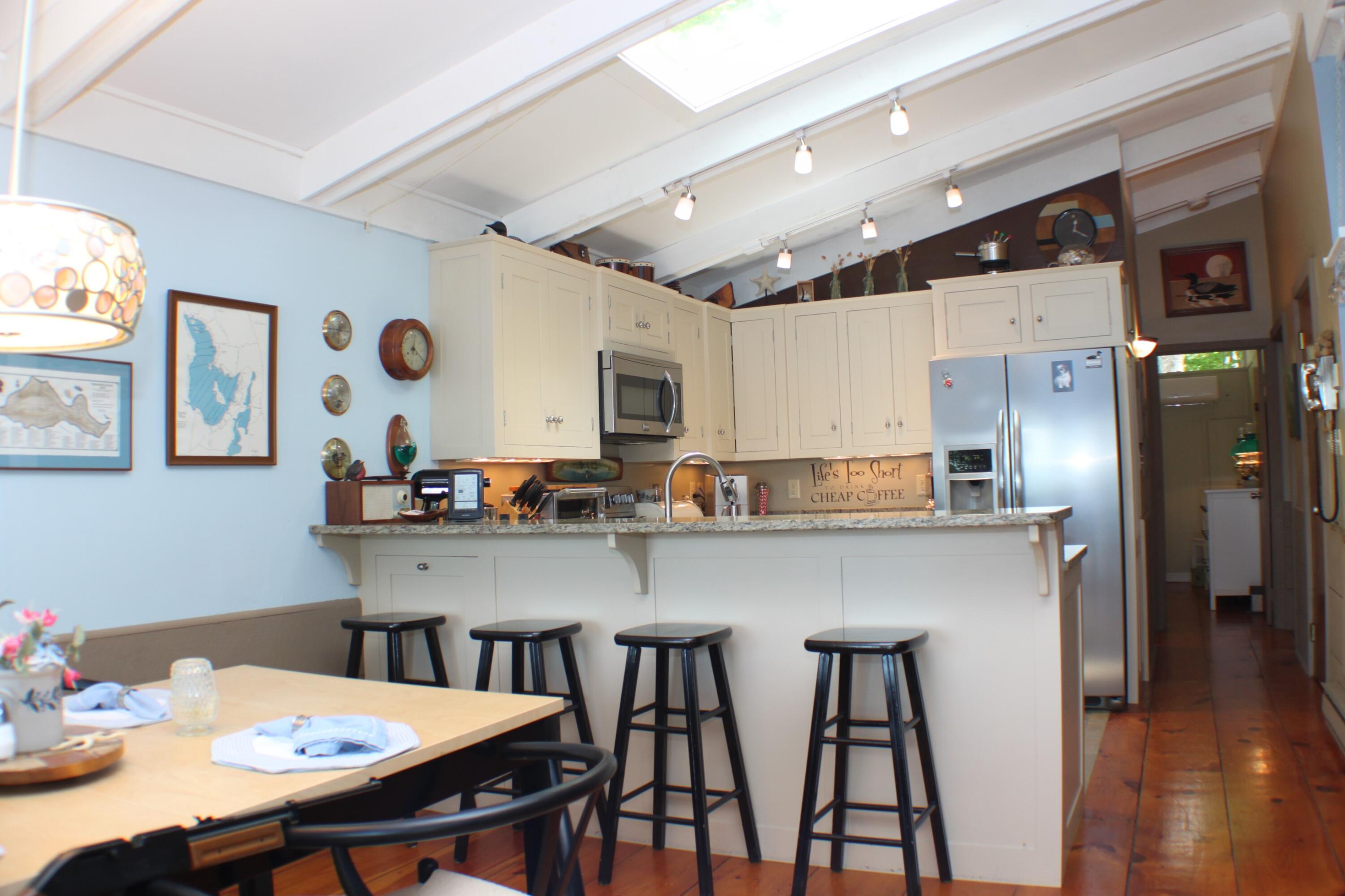 31 Treasure Island Road Shapleigh, ME 04076 - Photo 13 of 34 Dining looking into kitchen