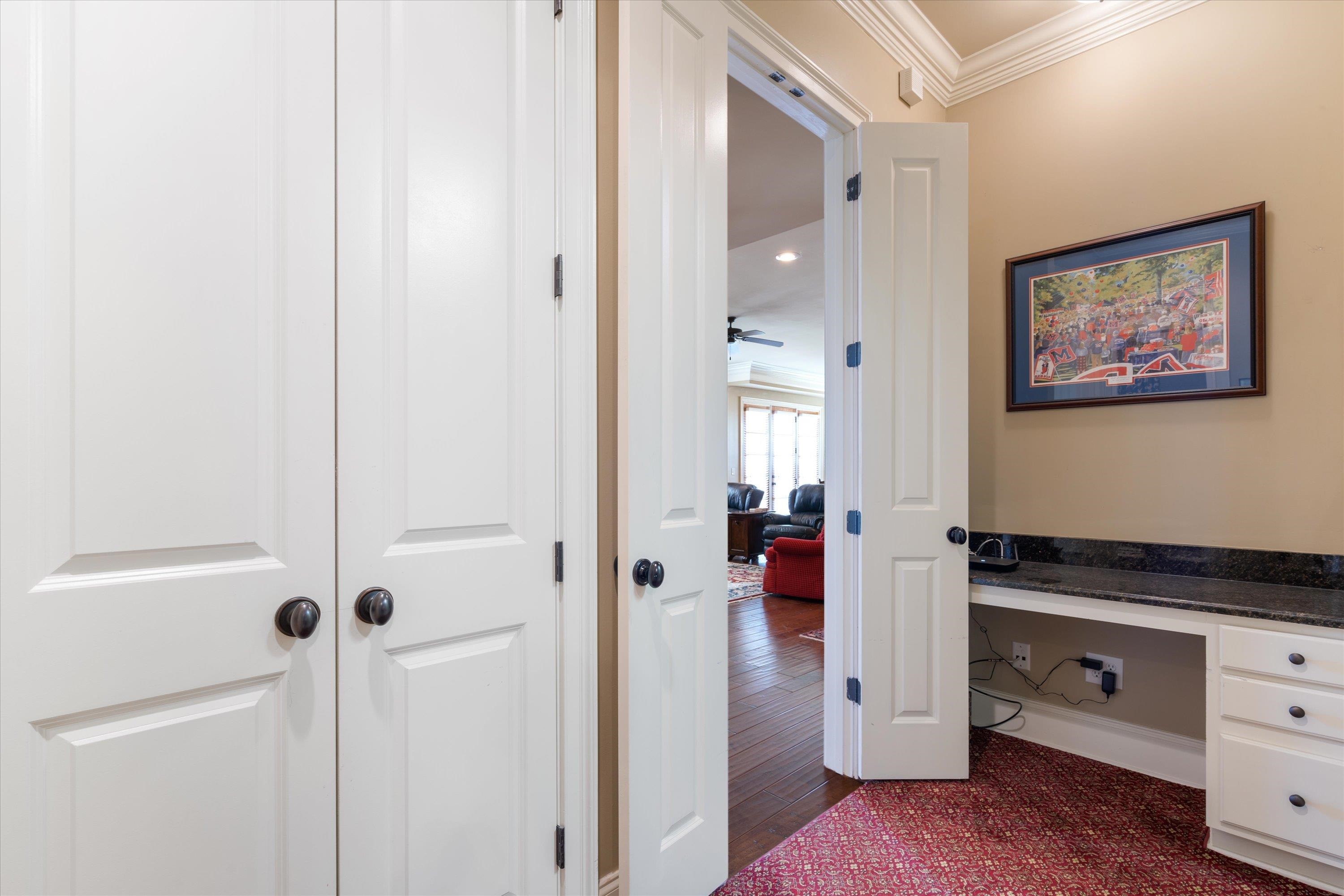 1100 Augusta Drive, Unit 103 Oxford, MS 38655 - Photo 17 of 24 a view of a bathroom with a bathtub and a mirror