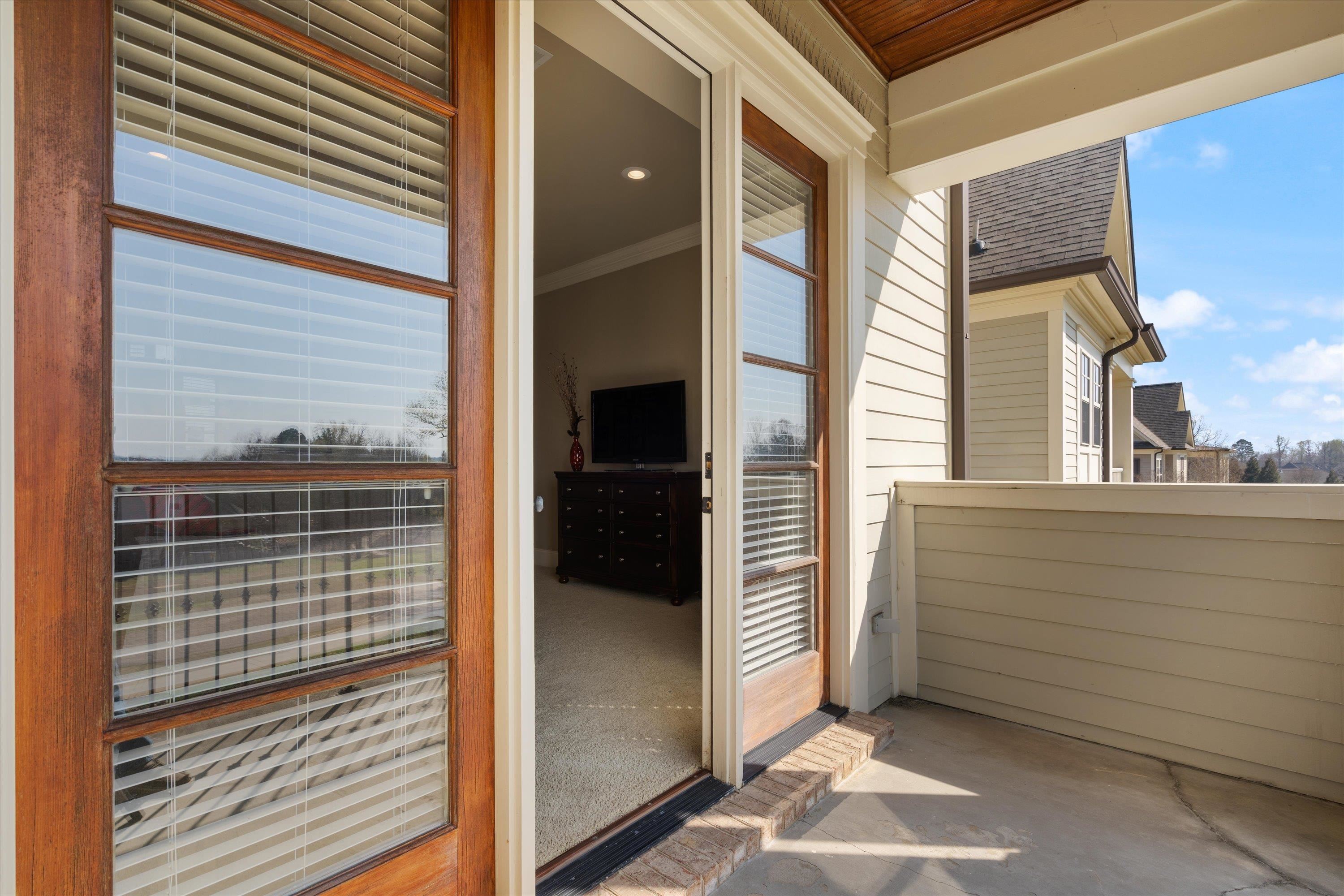 1100 Augusta Drive, Unit 103 Oxford, MS 38655 - Photo 18 of 24 a view of a balcony a door
