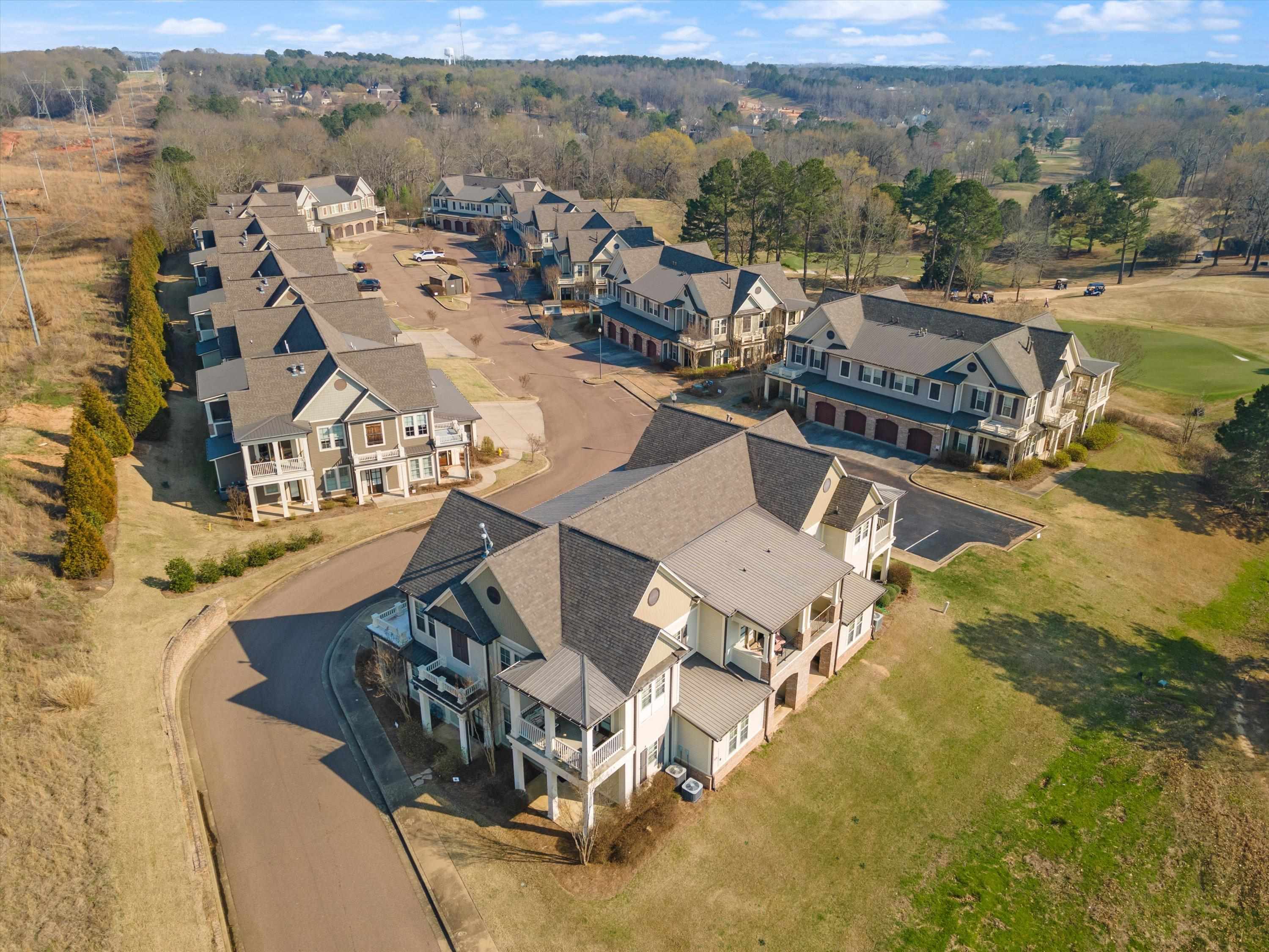 1100 Augusta Drive, Unit 103 Oxford, MS 38655 - Photo 22 of 24 an aerial view of a house with a big yard
