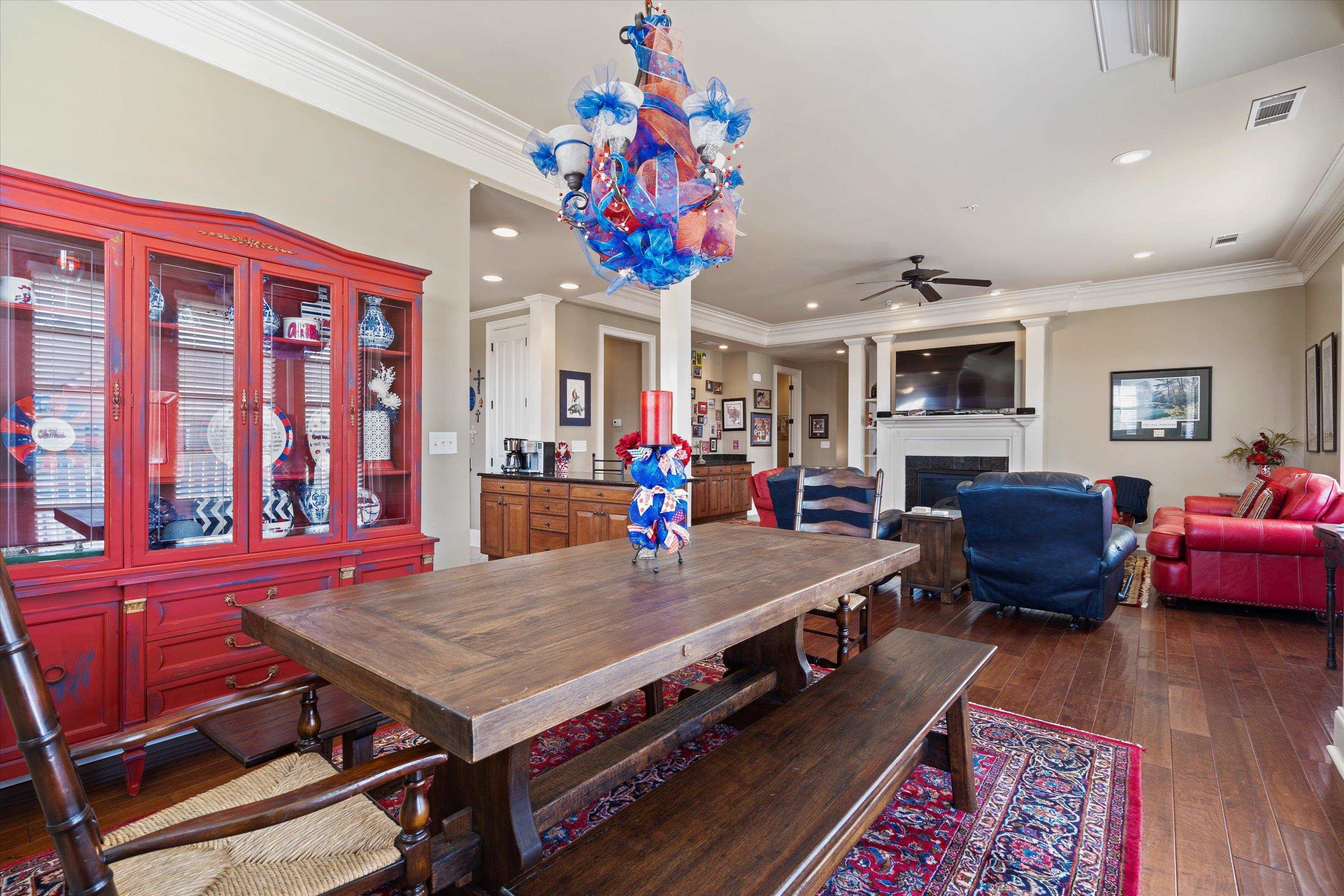 1100 Augusta Drive, Unit 103 Oxford, MS 38655 - Photo 10 of 24 a living room with furniture and a dining table