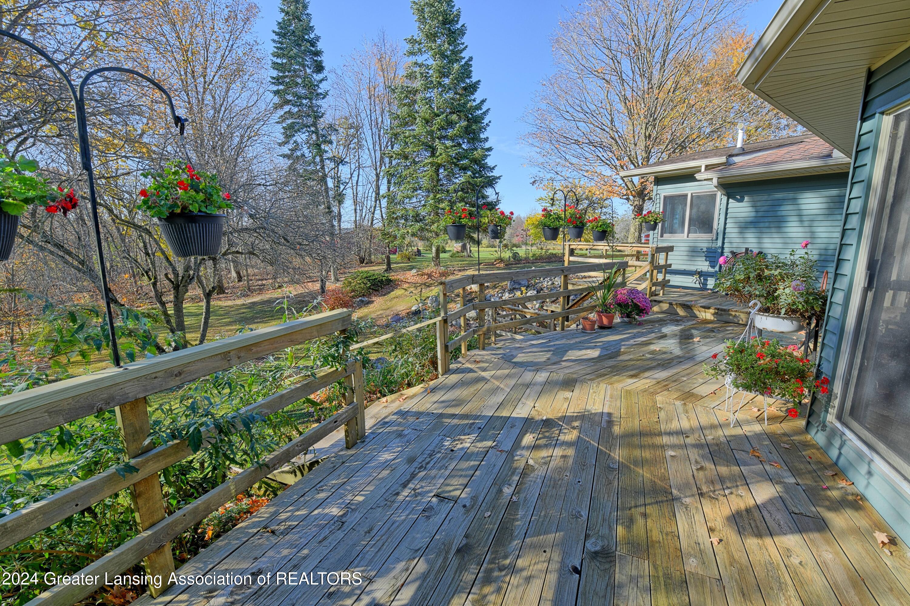 15027 West Cutler Road Portland, MI 48875 - Photo 37 of 65 wrap around deck
