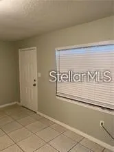 a view of a door and an empty space