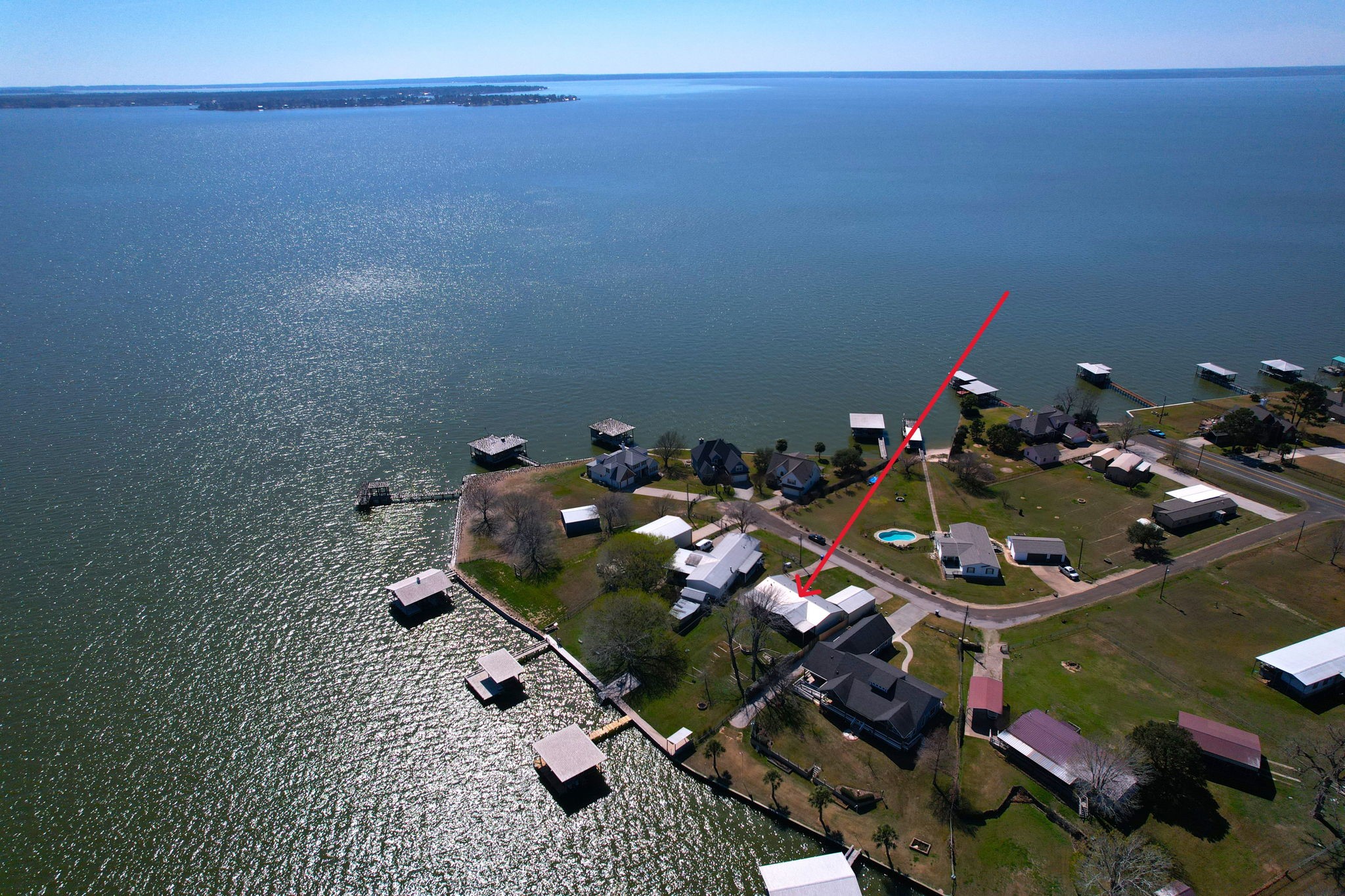 207 Vivian Road Onalaska, TX 77360 - Photo 3 of 33 Perfectly situated on the peninsula; protected yet open to the big lake.