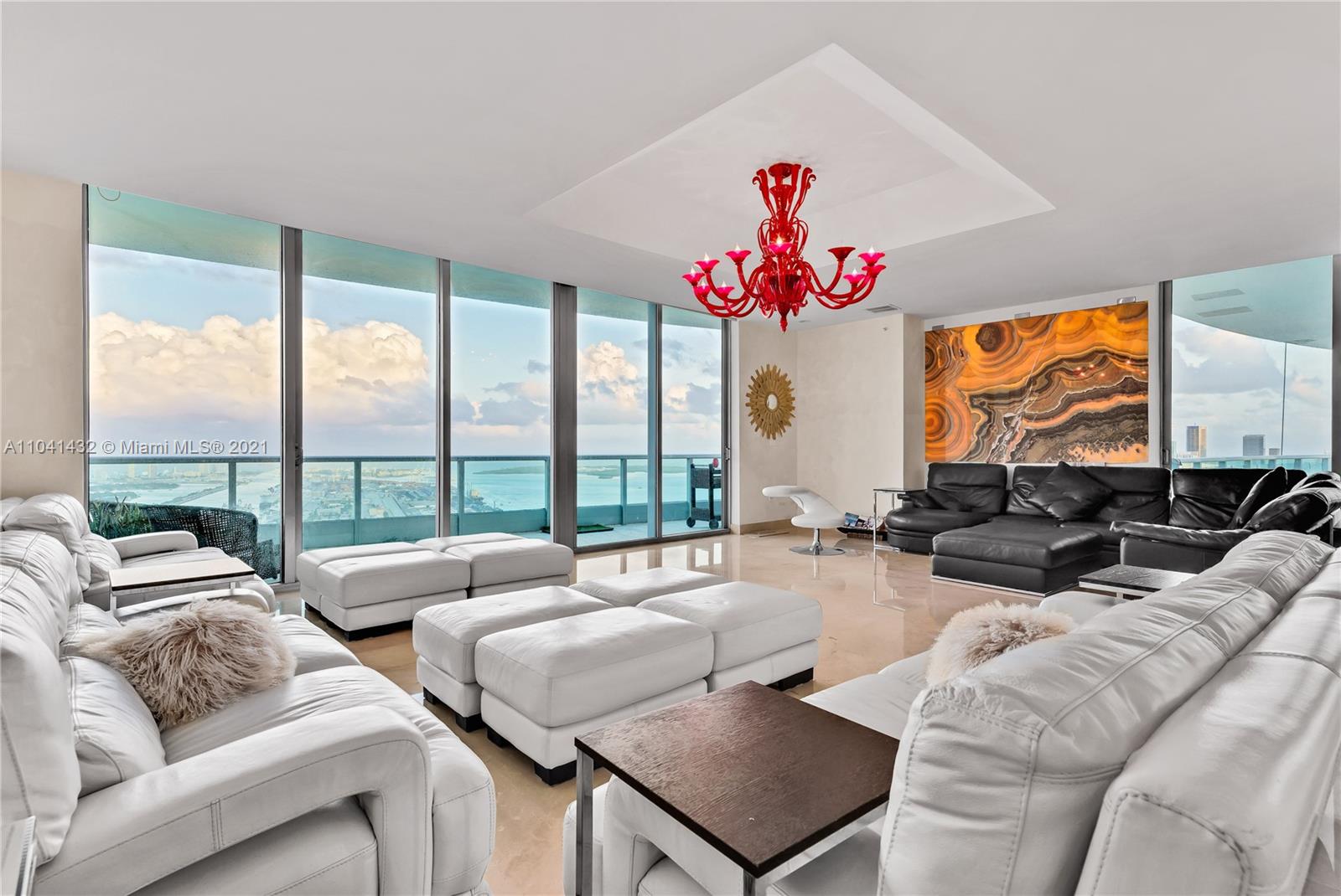 900 Biscayne Boulevard, Unit 6301 Miami, FL 33132 - Photo 25 of 72 a living room with furniture and a large window