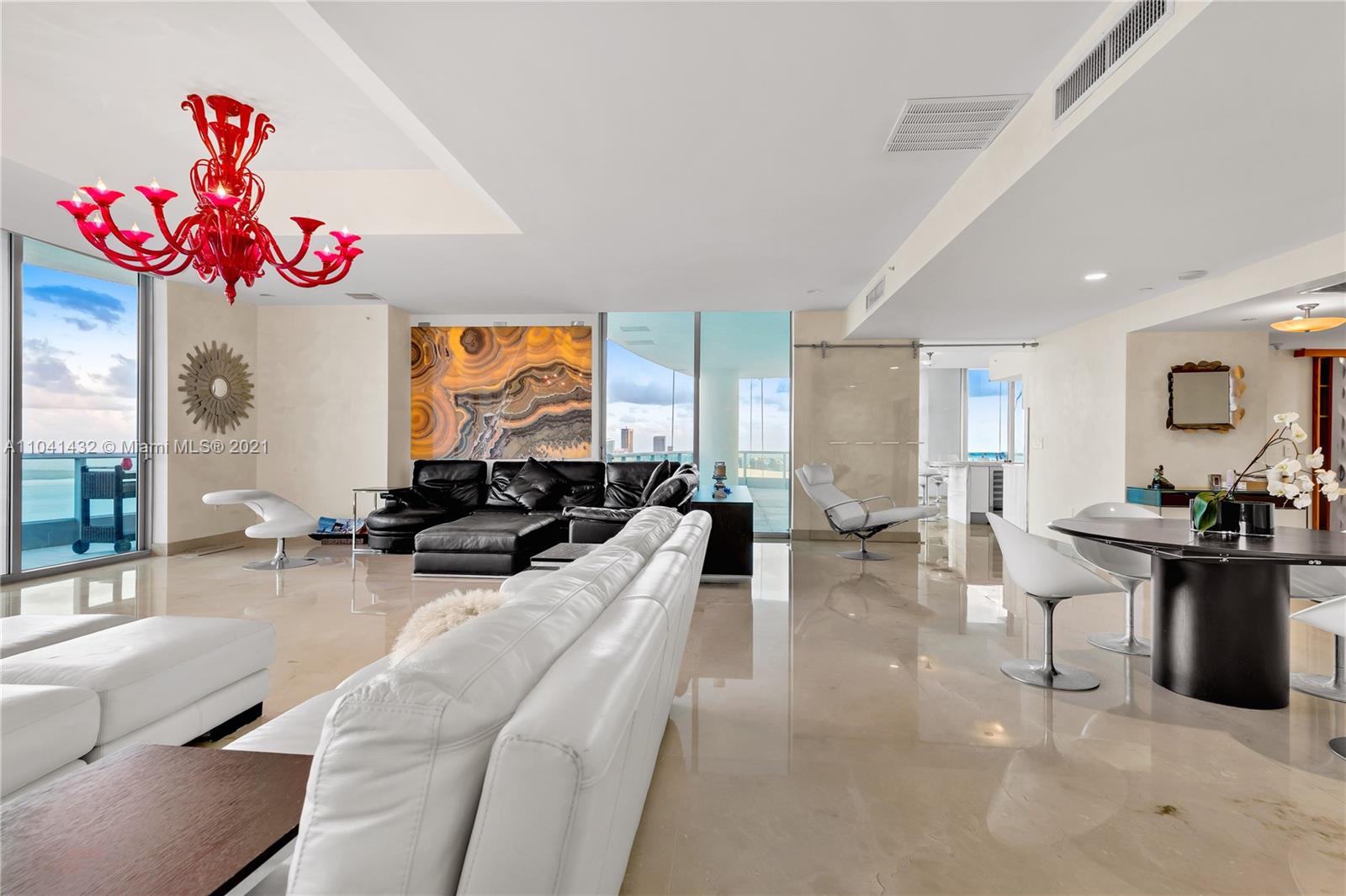 900 Biscayne Boulevard, Unit 6301 Miami, FL 33132 - Photo 26 of 72 a living room with furniture a couch and a flat screen tv