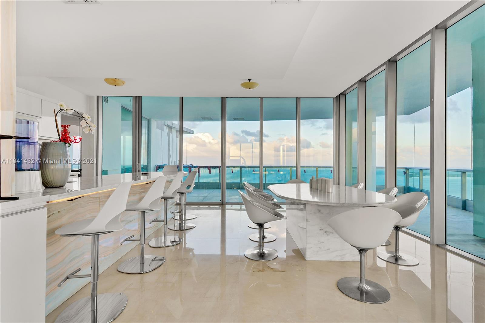 900 Biscayne Boulevard, Unit 6301 Miami, FL 33132 - Photo 36 of 72 a living room with furniture and a large window