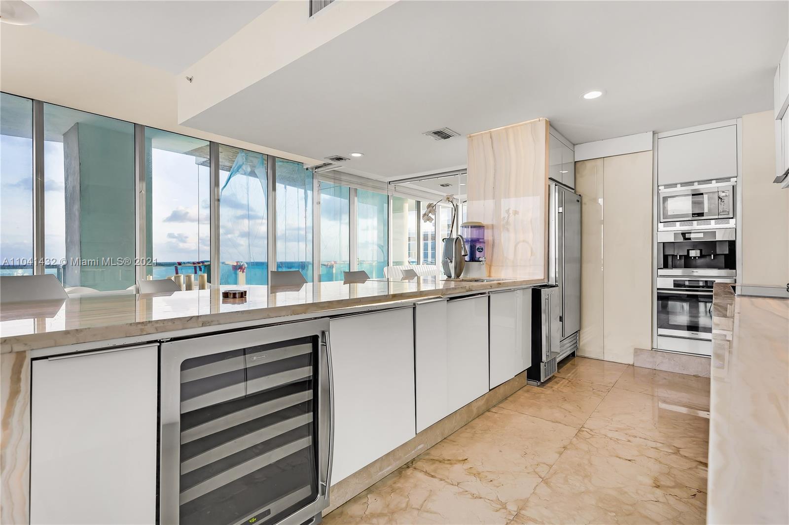 900 Biscayne Boulevard, Unit 6301 Miami, FL 33132 - Photo 40 of 72 a kitchen with stainless steel appliances a refrigerator and a sink