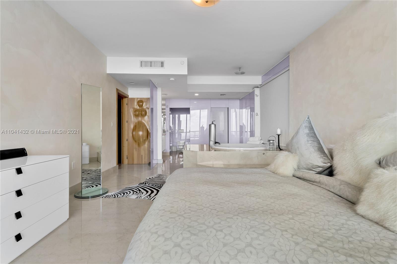 900 Biscayne Boulevard, Unit 6301 Miami, FL 33132 - Photo 46 of 72 a spacious bathroom with a bathtub and shower