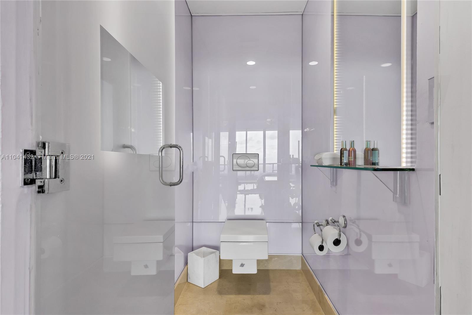 900 Biscayne Boulevard, Unit 6301 Miami, FL 33132 - Photo 48 of 72 a bathroom with a bathtub and a shower