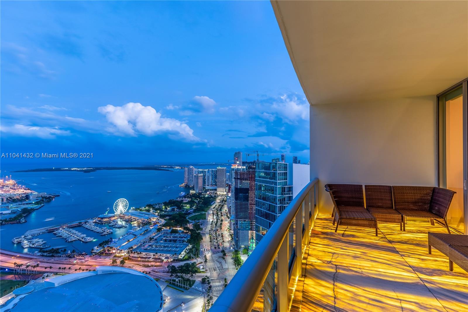 900 Biscayne Boulevard, Unit 6301 Miami, FL 33132 - Photo 72 of 72 a view of a balcony with two chairs