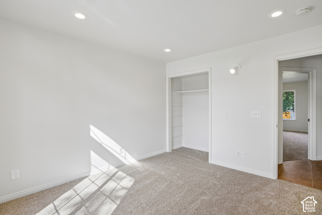 190 North 100 West Alpine, UT 84004 - Photo 13 of 31 White walls, recessed ceiling lighting, light-toned carpet, and a built-in closet with shelving and hanging rod