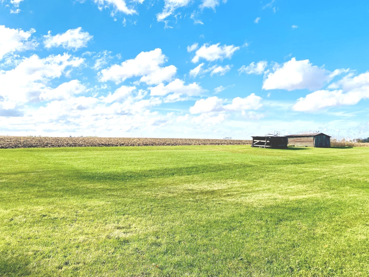 210 South 1st Street Holcomb, IL 61043 - Photo 14 of 15 a view of an ocean and a yard
