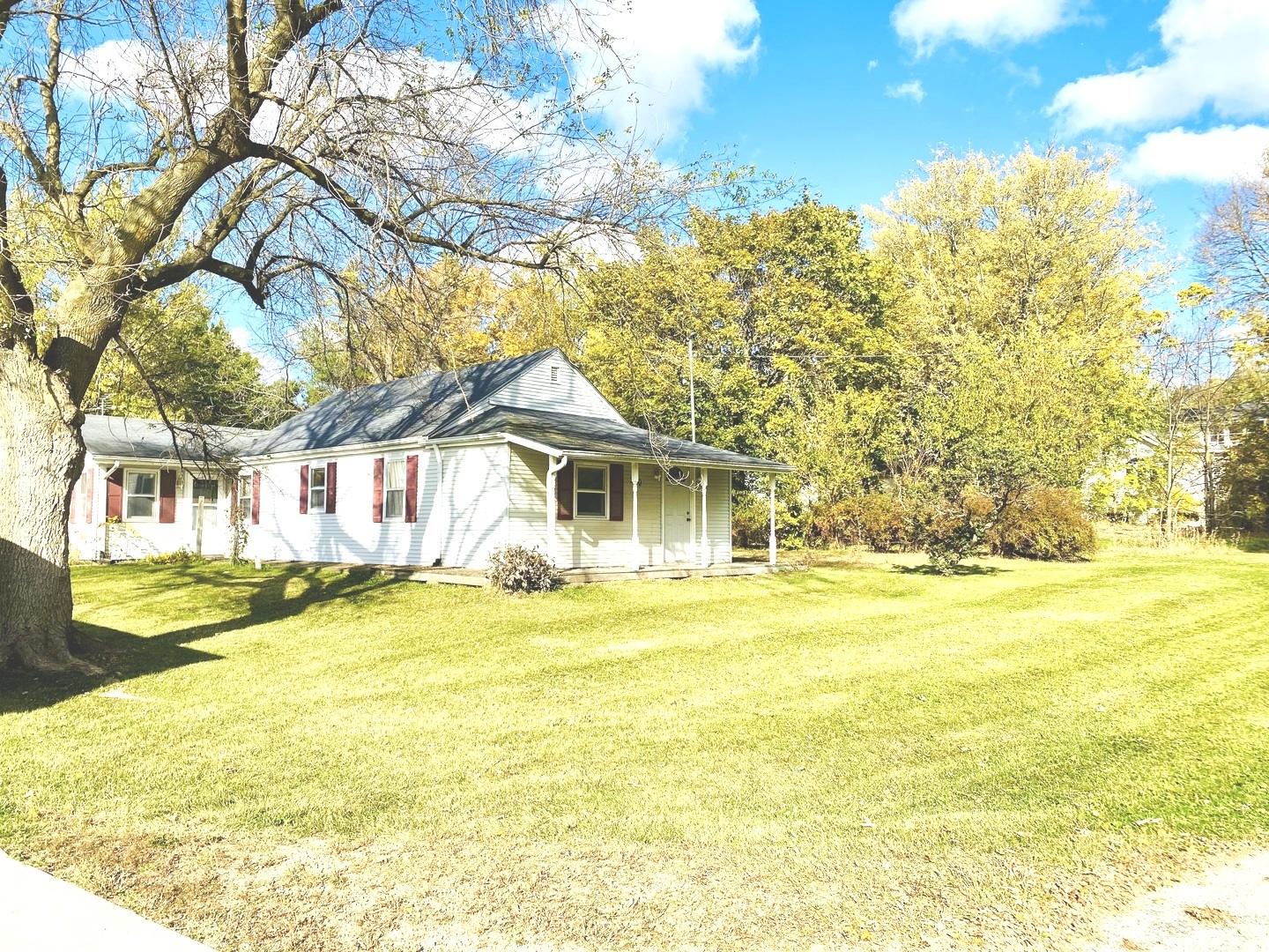 210 South 1st Street Holcomb, IL 61043 - Photo 2 of 15 a front view of a house with a ocean view