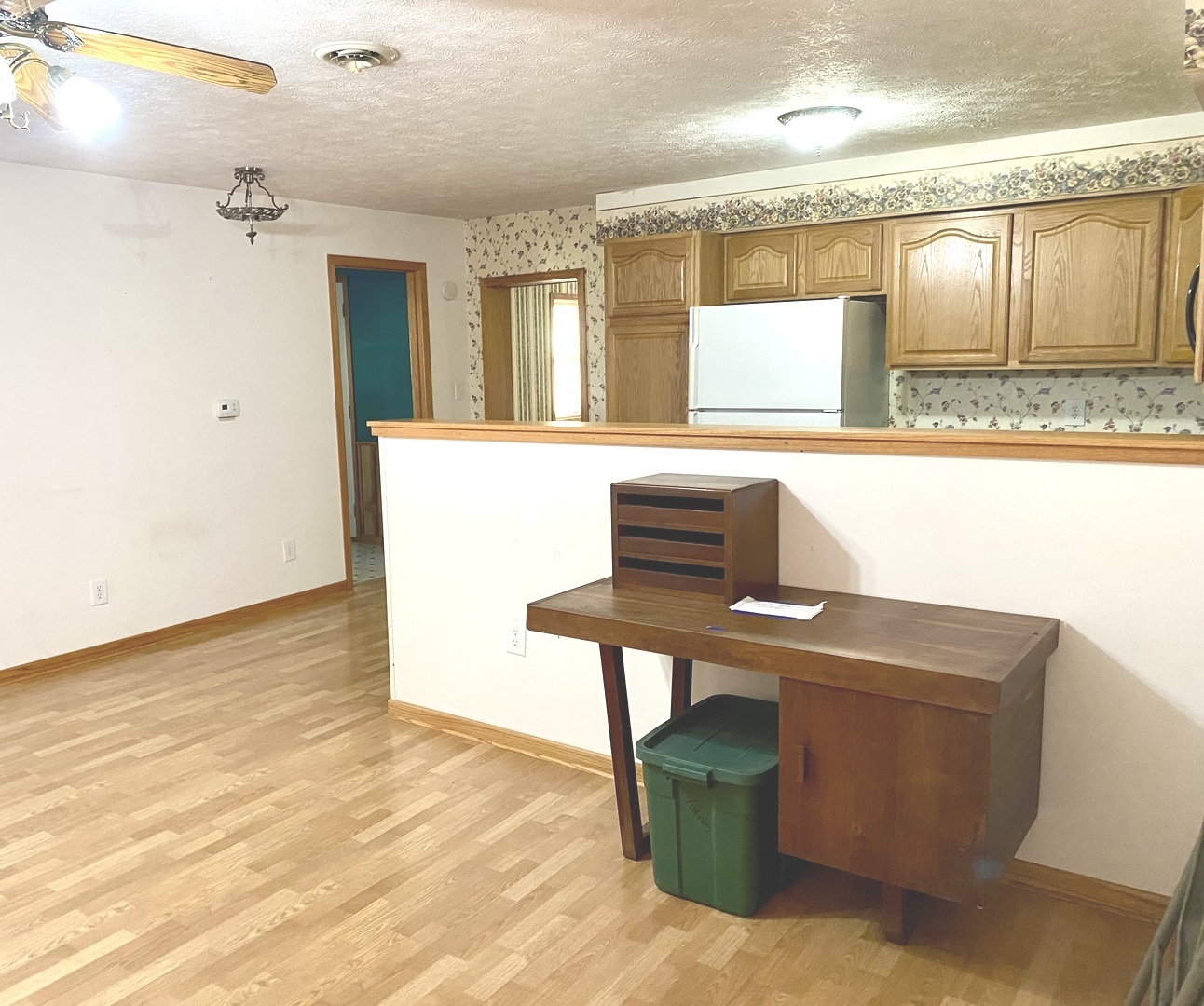 210 South 1st Street Holcomb, IL 61043 - Photo 4 of 15 a workspace with kitchen island