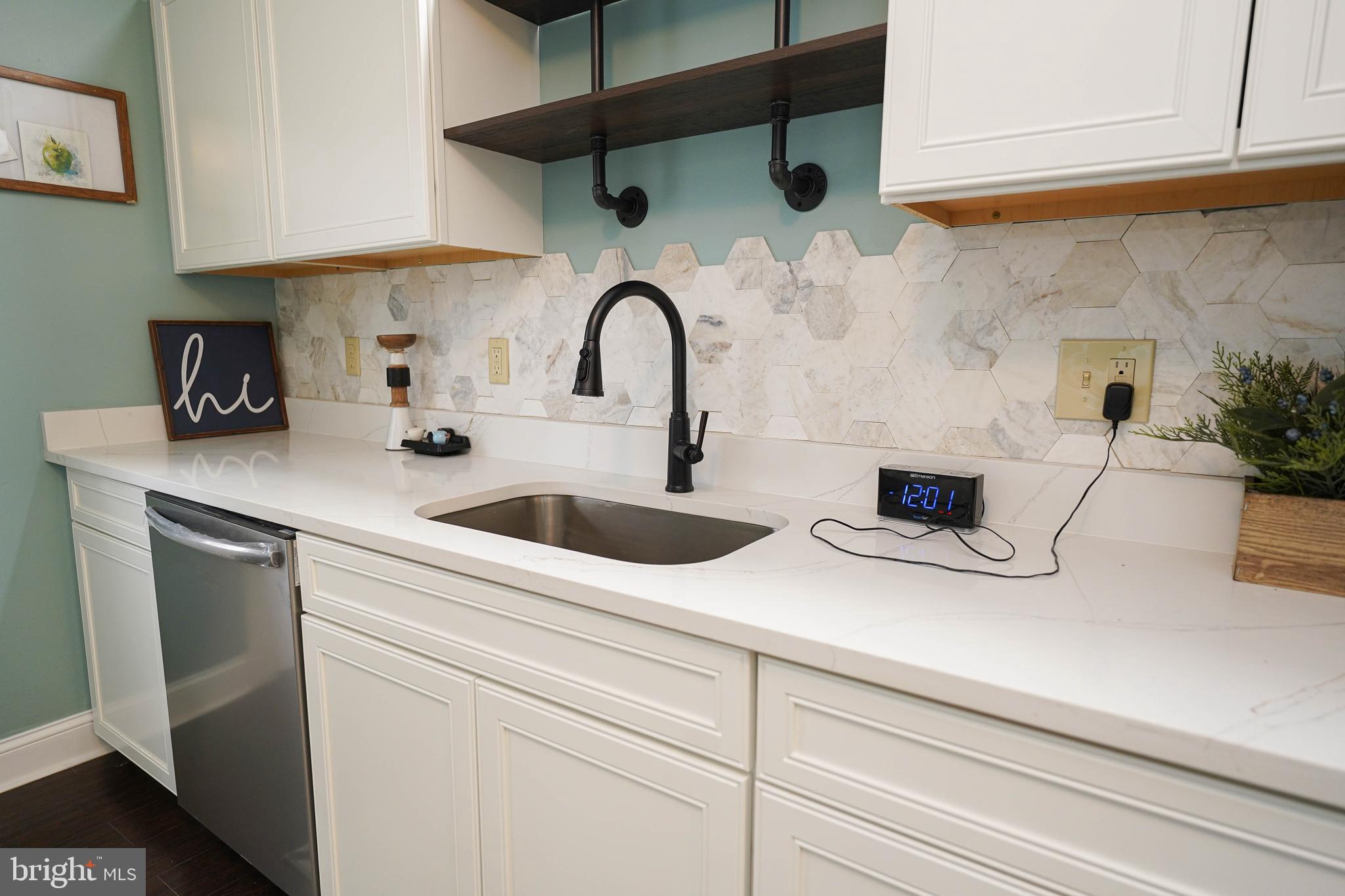3493 Meadow Bridge Road Eden, MD 21822 - Photo 16 of 36 a kitchen with stainless steel appliances a sink dishwasher and cabinets