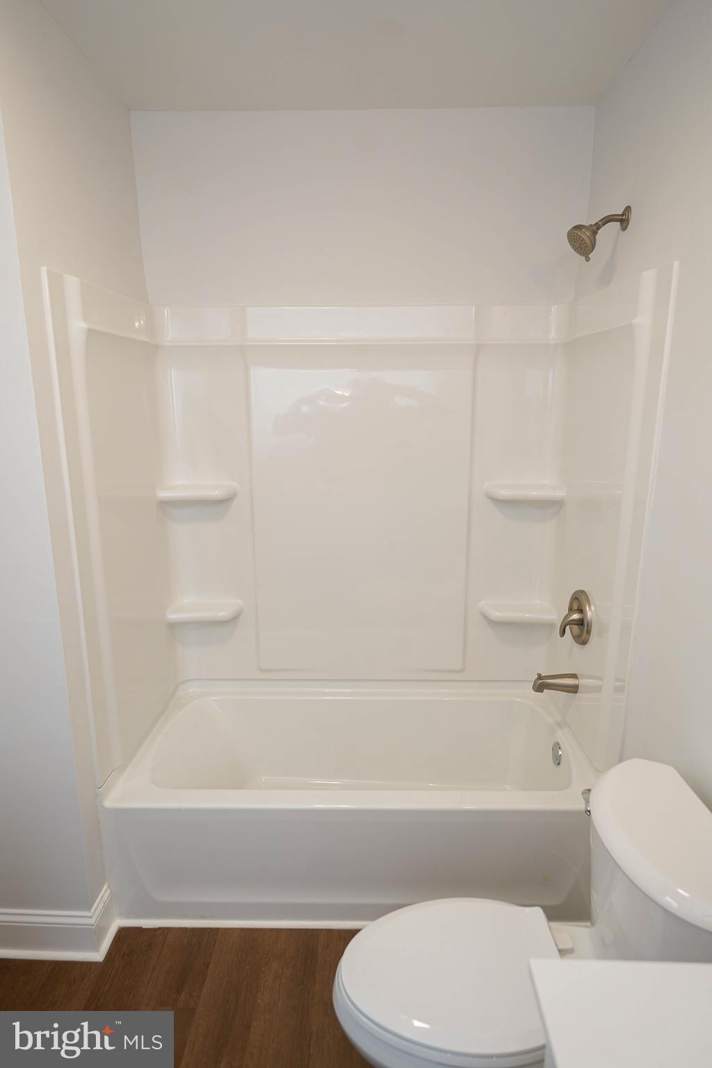 3493 Meadow Bridge Road Eden, MD 21822 - Photo 24 of 36 a bathroom with a toilet and a bath tub