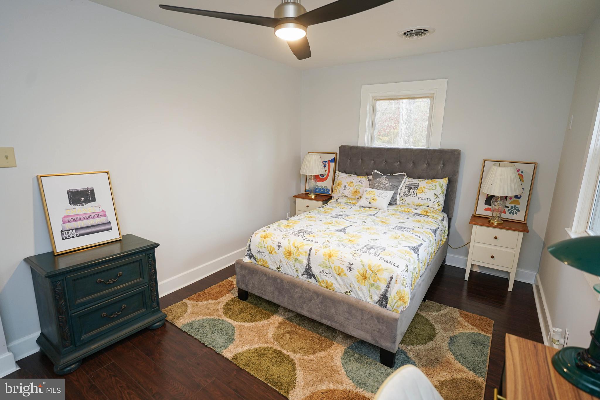 3493 Meadow Bridge Road Eden, MD 21822 - Photo 27 of 36 a bedroom with a bed and wooden floor