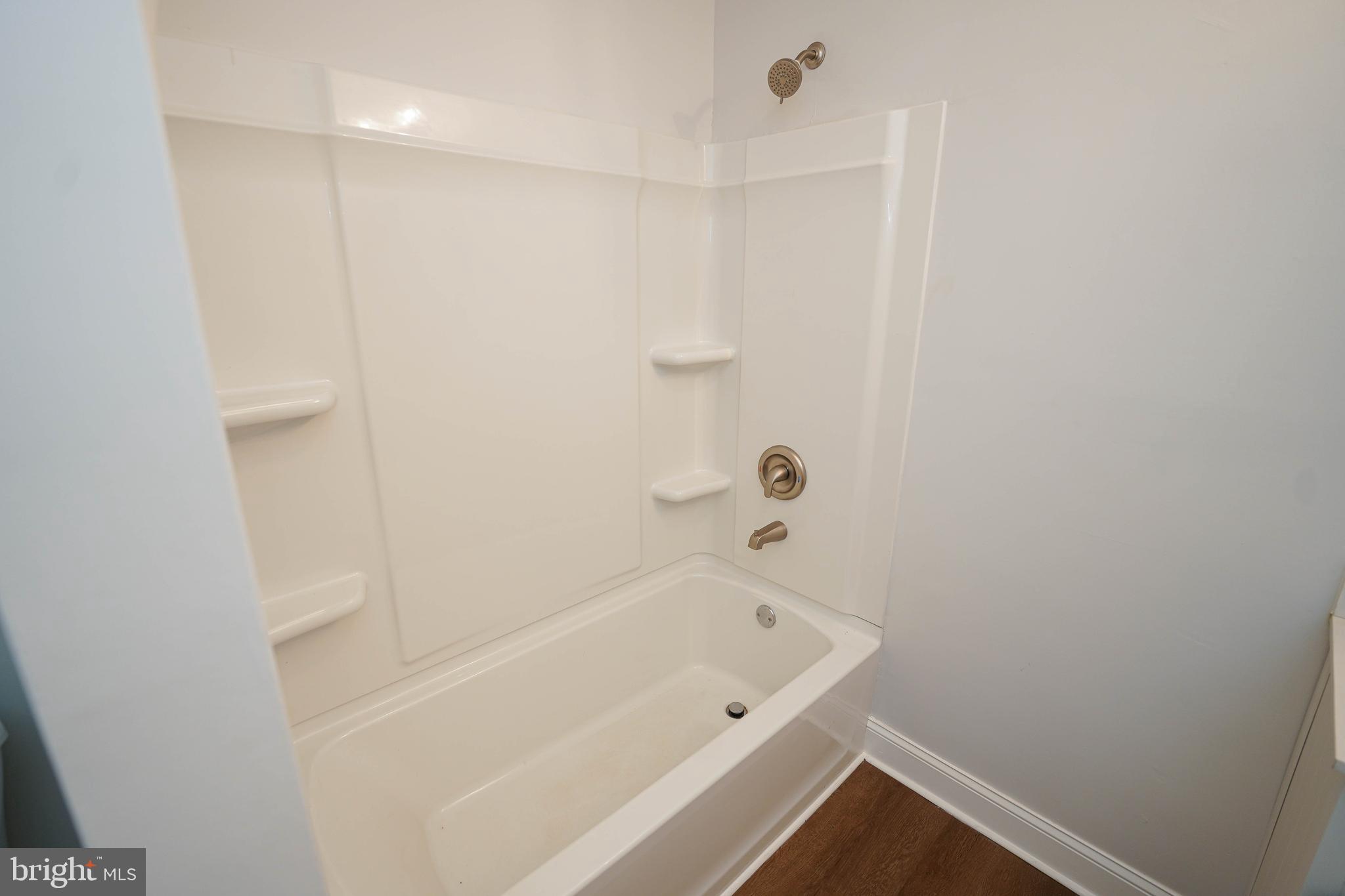 3493 Meadow Bridge Road Eden, MD 21822 - Photo 32 of 36 a bathroom with a bathtub and shower