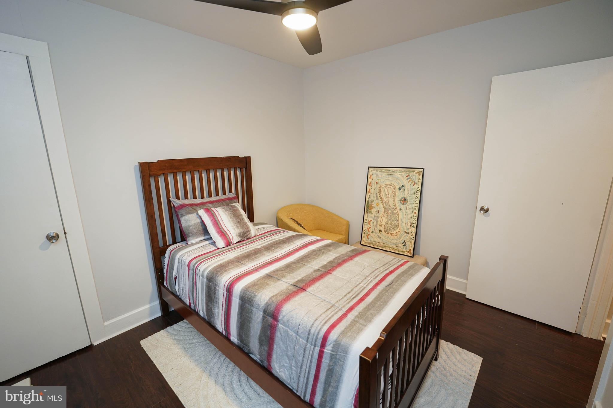 3493 Meadow Bridge Road Eden, MD 21822 - Photo 36 of 36 a bedroom with a bed and painting on the wall