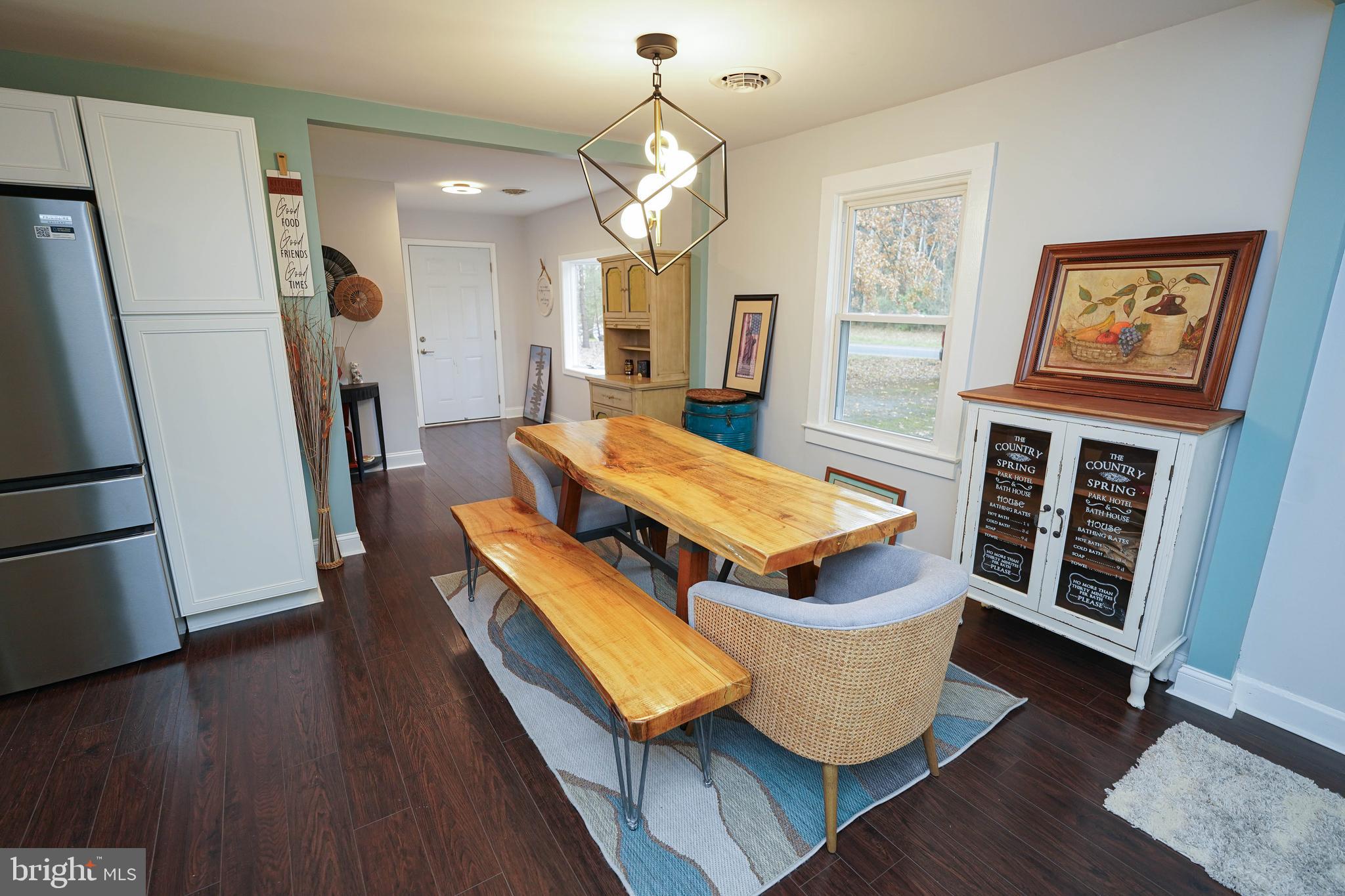 3493 Meadow Bridge Road Eden, MD 21822 - Photo 10 of 36 a living room with furniture and a wooden floor