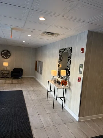 a view of a livingroom with furniture and furniture