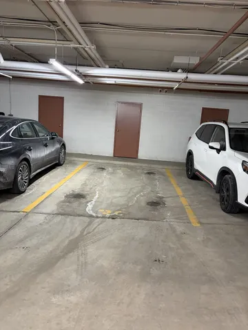 a car parked in parking space with a sink