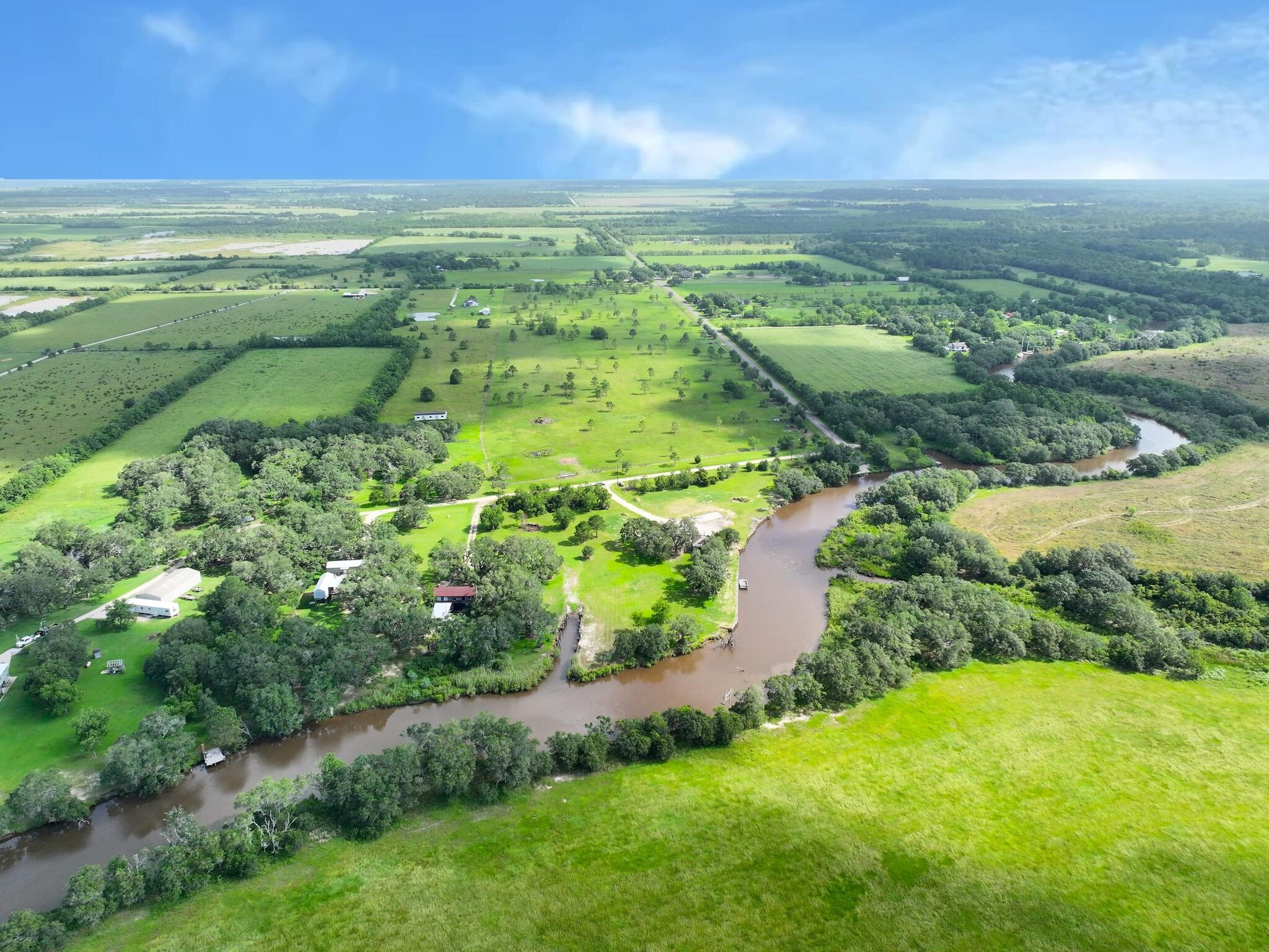 1734 Haynes Road Anahuac, TX 77514 - Photo 3 of 23 a view of a garden with an ocean