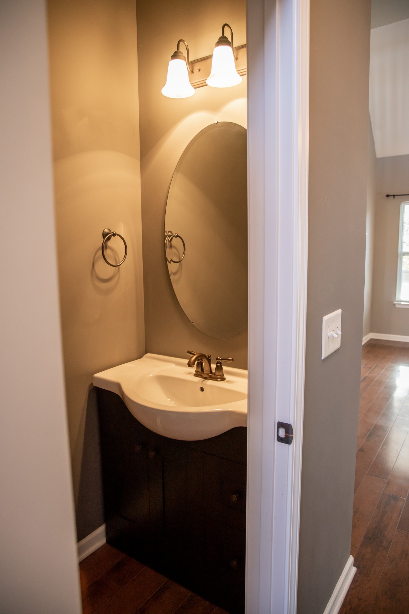 2030 Lincoln Road Spring Hill, TN 37174 - Photo 13 of 29 a bathroom with a sink mirror and vanity
