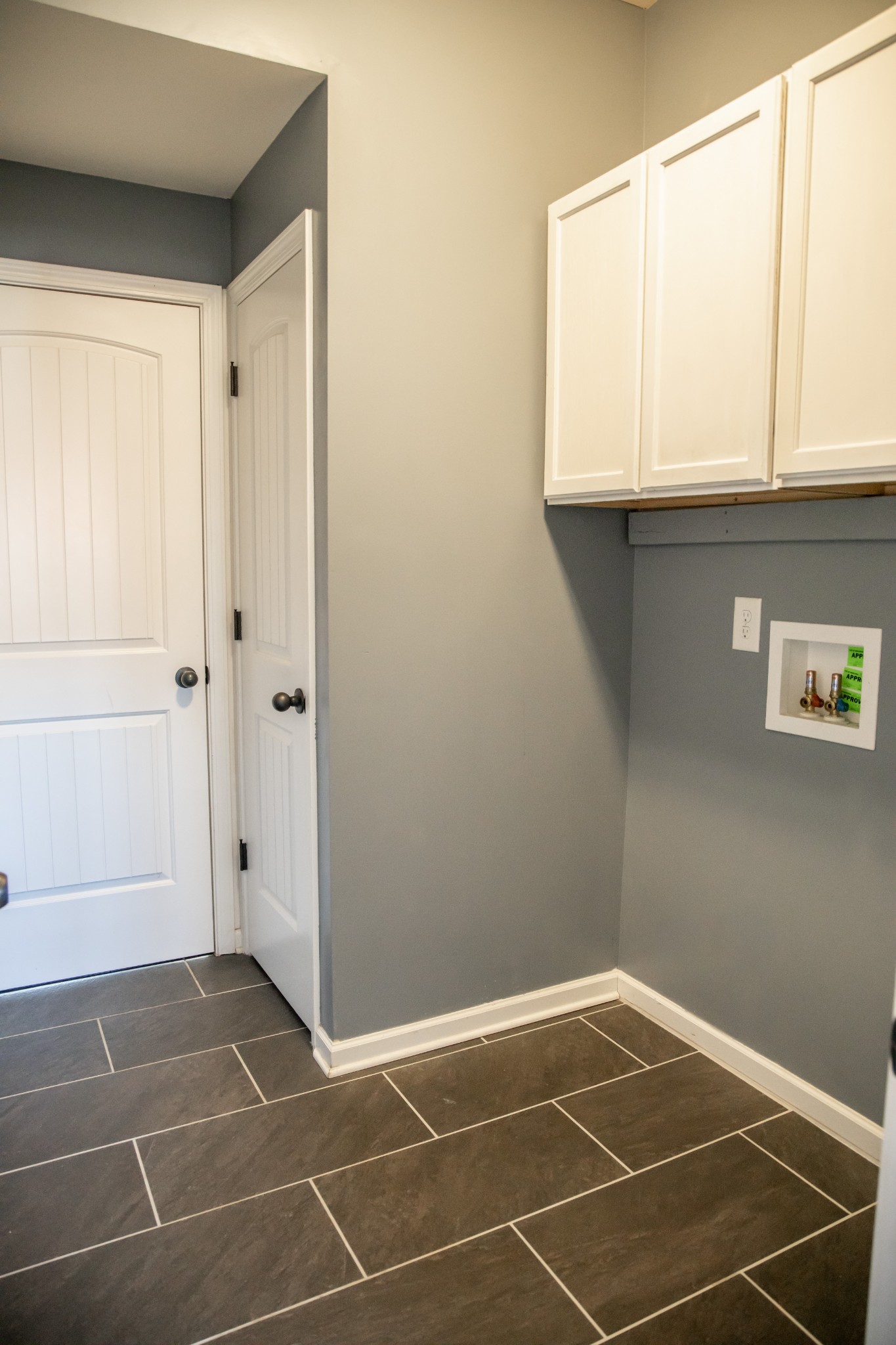 2030 Lincoln Road Spring Hill, TN 37174 - Photo 19 of 29 a view of a room with wooden floor and white walls