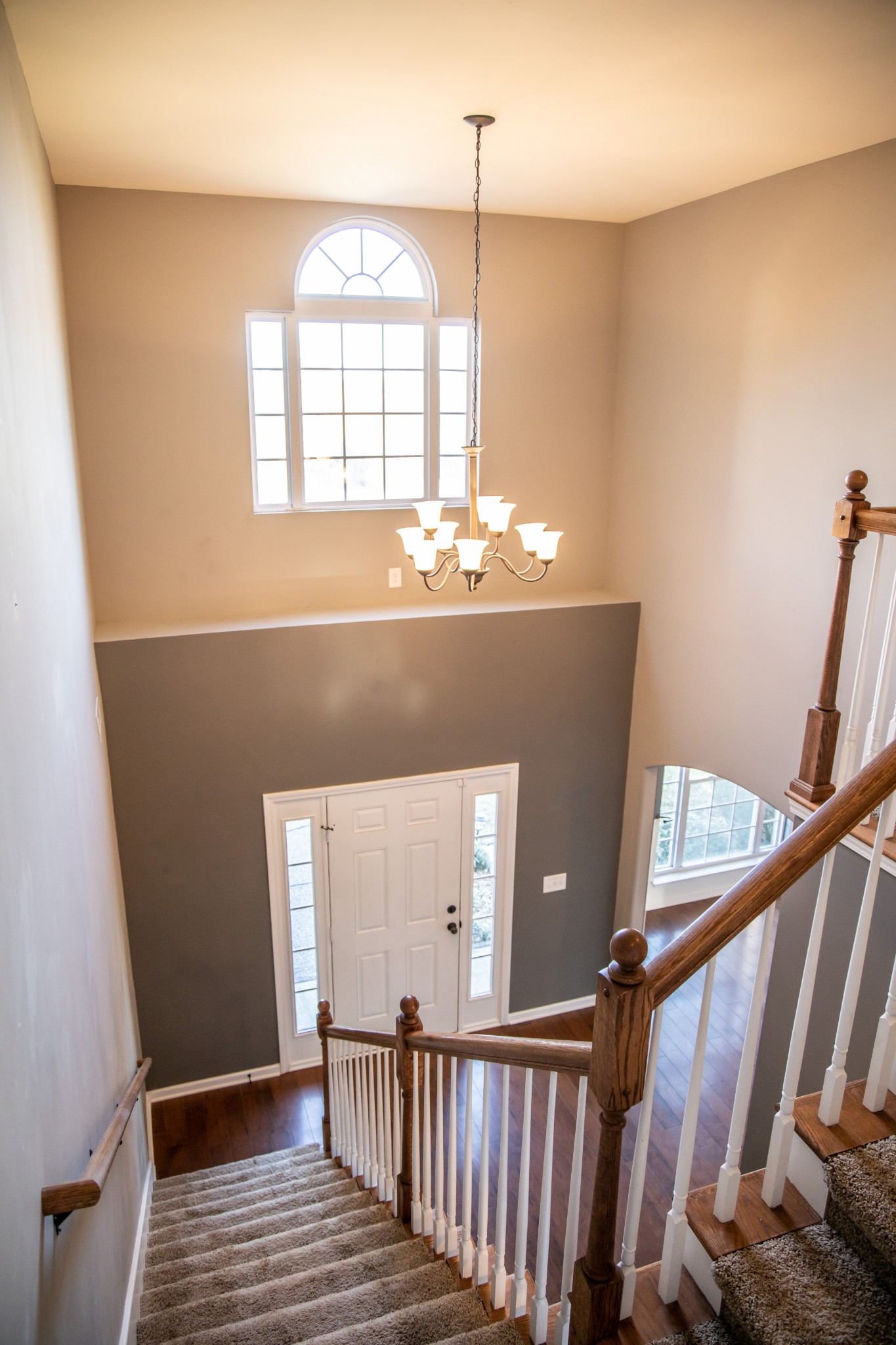 2030 Lincoln Road Spring Hill, TN 37174 - Photo 20 of 29 a view of a livingroom with wooden floor and stairs