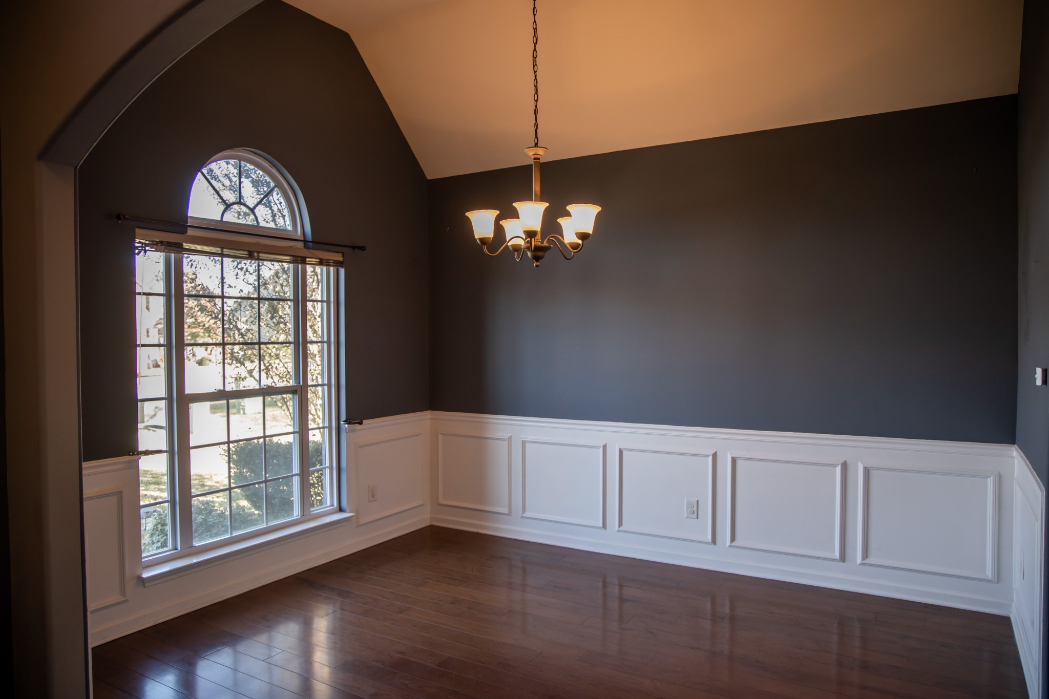 2030 Lincoln Road Spring Hill, TN 37174 - Photo 4 of 29 a view of an empty room with wooden floor and a window
