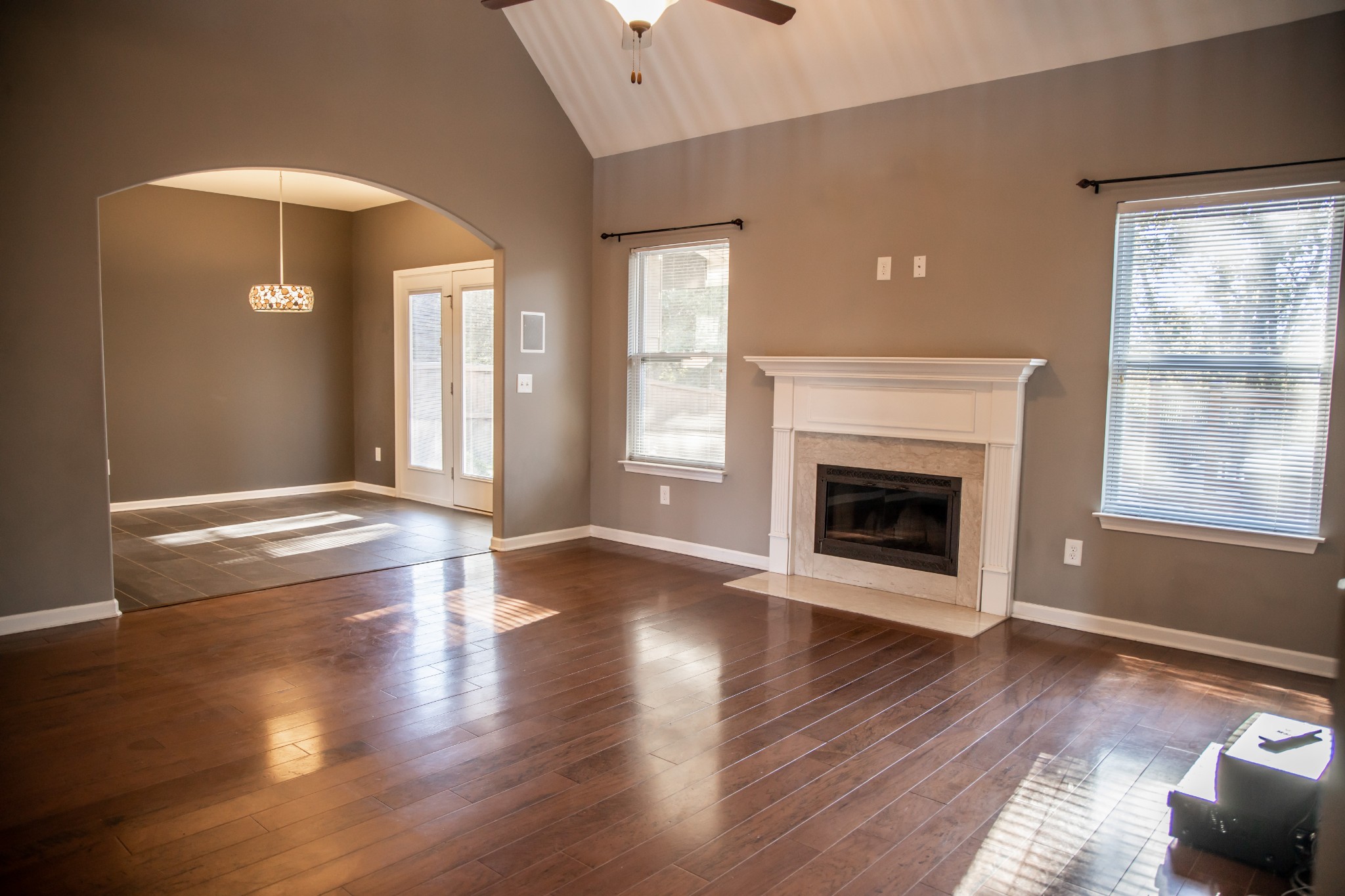 2030 Lincoln Road Spring Hill, TN 37174 - Photo 9 of 29 a view of an empty room with wooden floor and a window