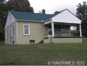 504 Barnard Road Marshall, NC 28753 - Photo 12 of 12 a front view of a house with a garden