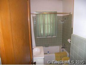 504 Barnard Road Marshall, NC 28753 - Photo 7 of 12 a bathroom with a shower