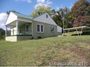504 Barnard Road Marshall, NC 28753 - Photo 9 of 12 a view of a house with a yard